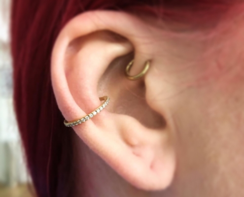 conch ring rook piercing