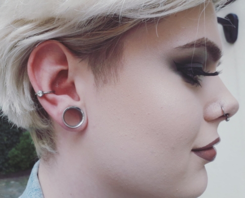 conch ring piercing tunnel streched earlobe