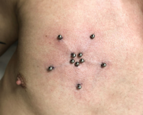 surface chest brust piercing