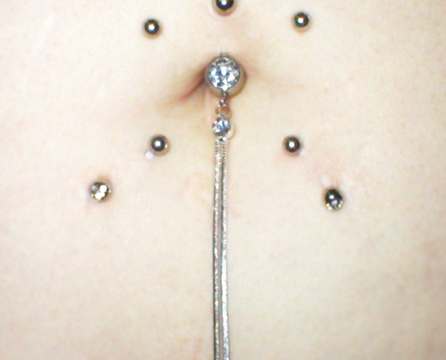 bauchnabel navell belly button piercing surface